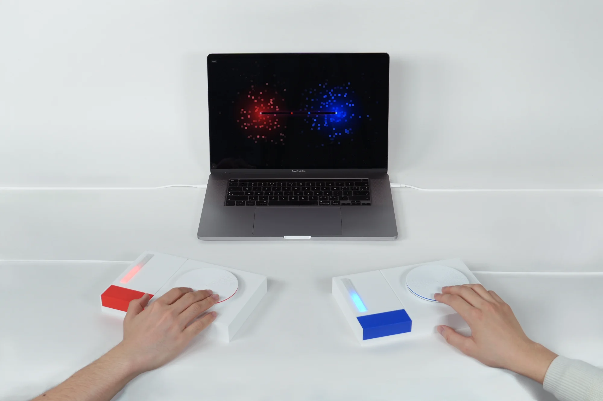 A two-player music battle made physical through a one-dimensional interface.